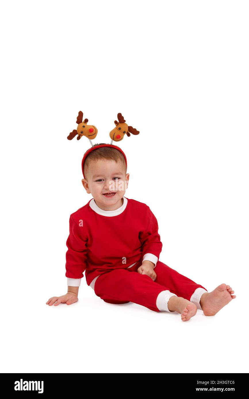 Laughing boy with reindeer hair band Stock Photo