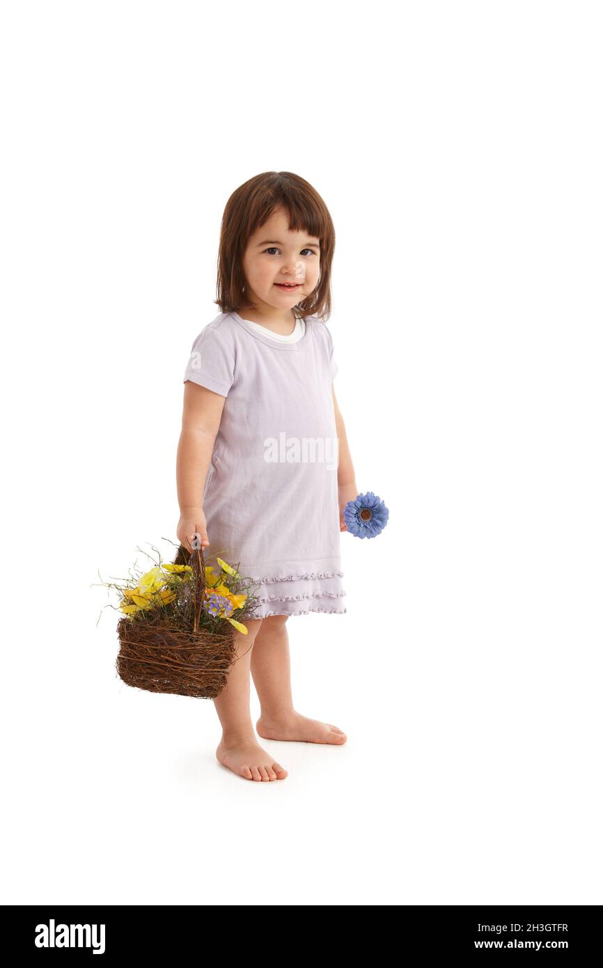 Sweet girl with flower basket Stock Photo Alamy