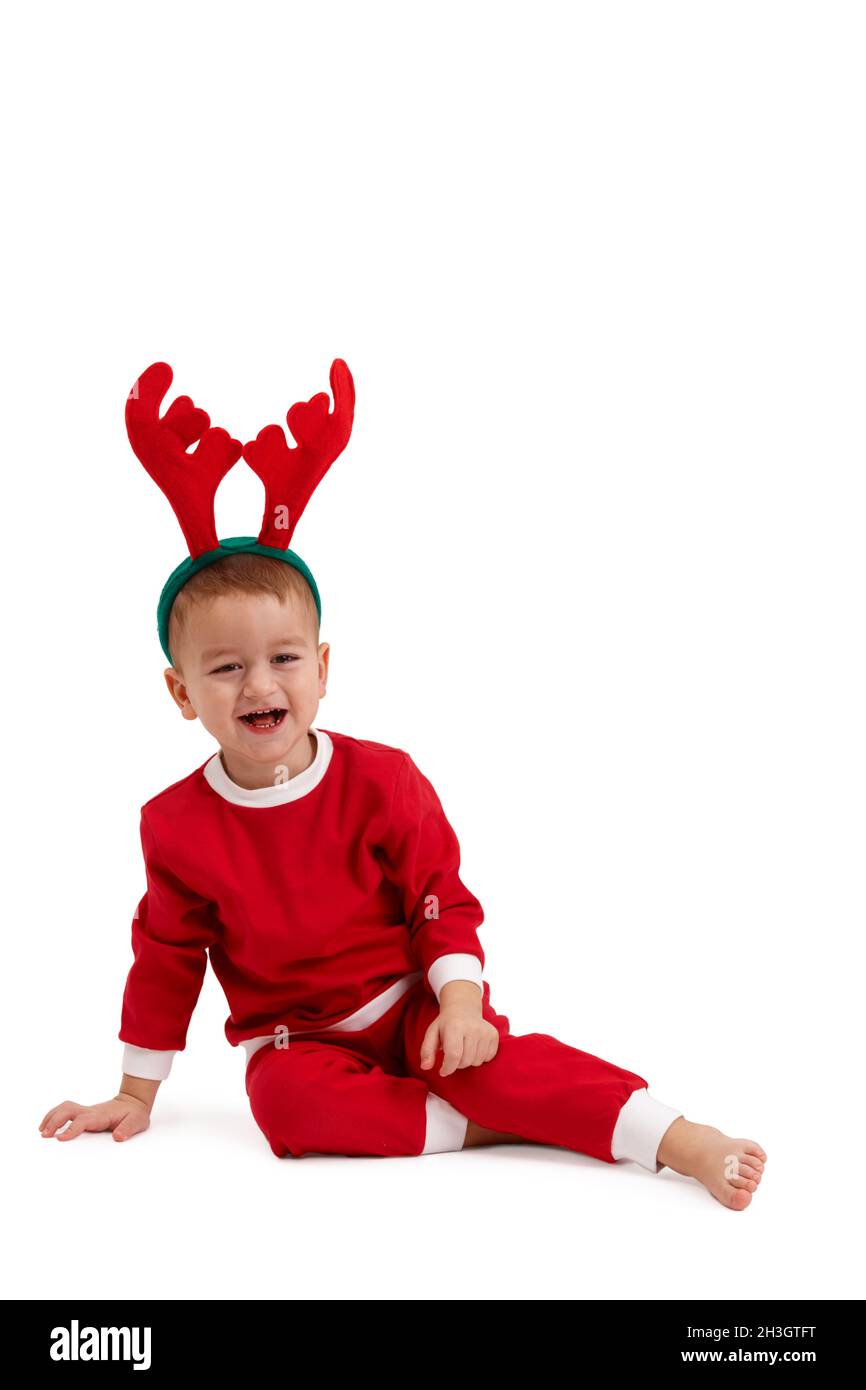 Little boy with reindeer hair band Stock Photo