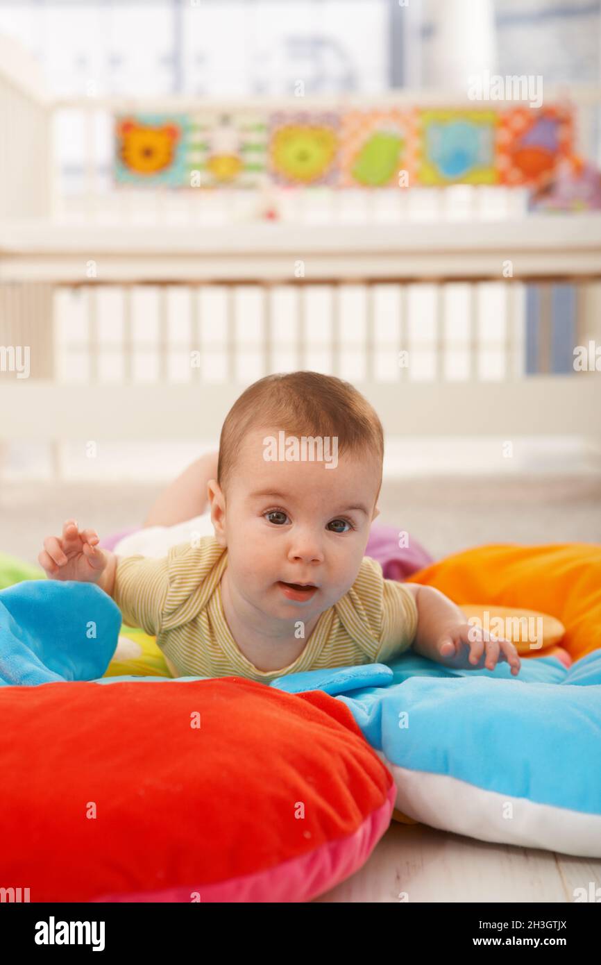 Sweet baby on playmat Stock Photo Alamy