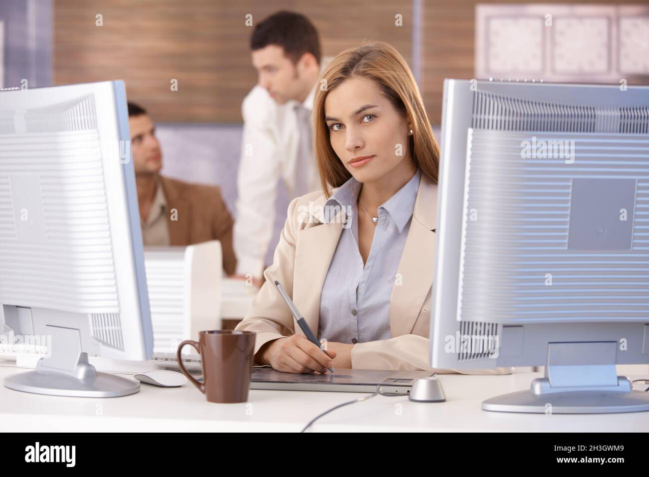 Young woman learning computer graphic design Stock Photo