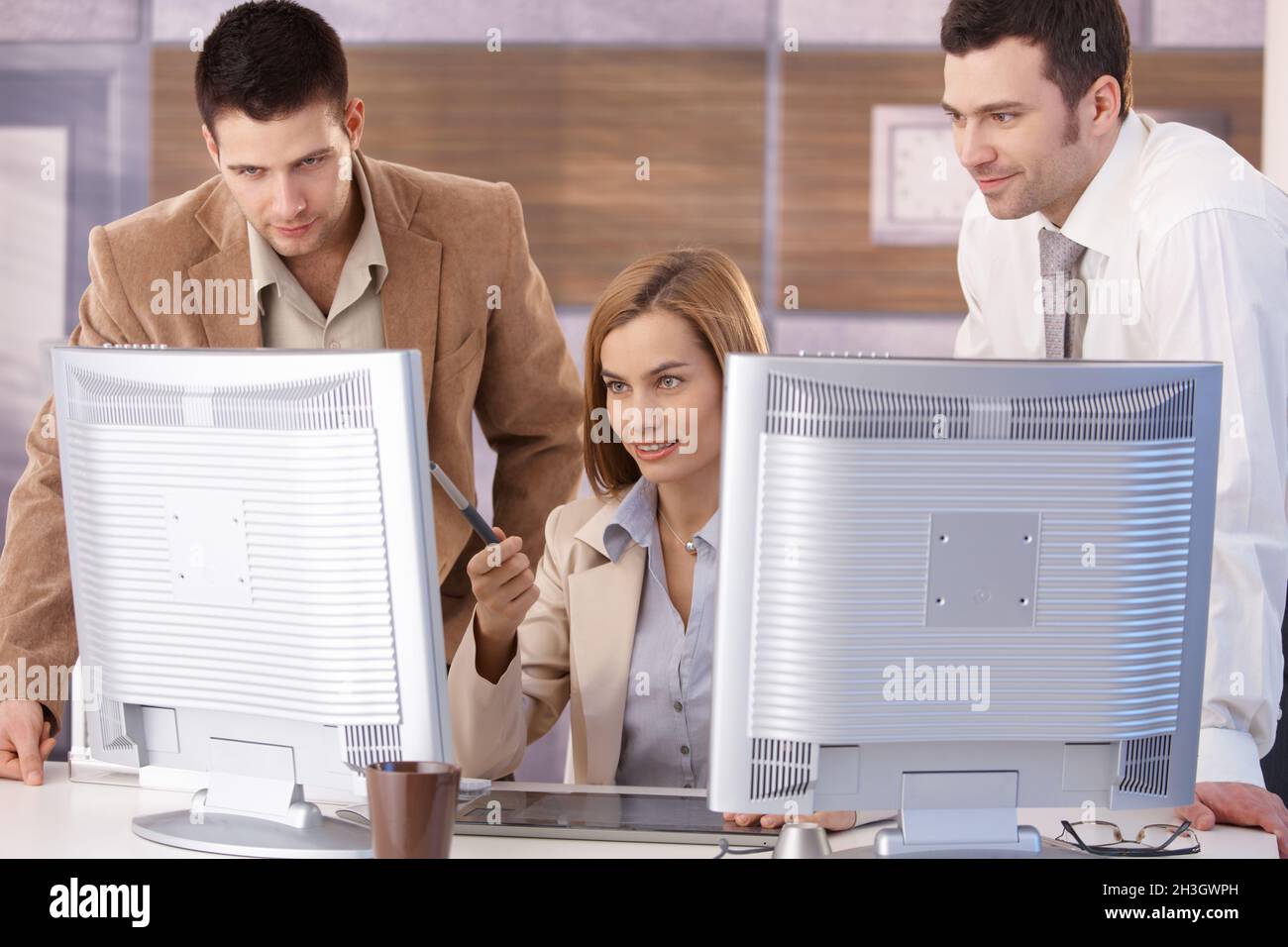 Young team learning computer graphic design Stock Photo