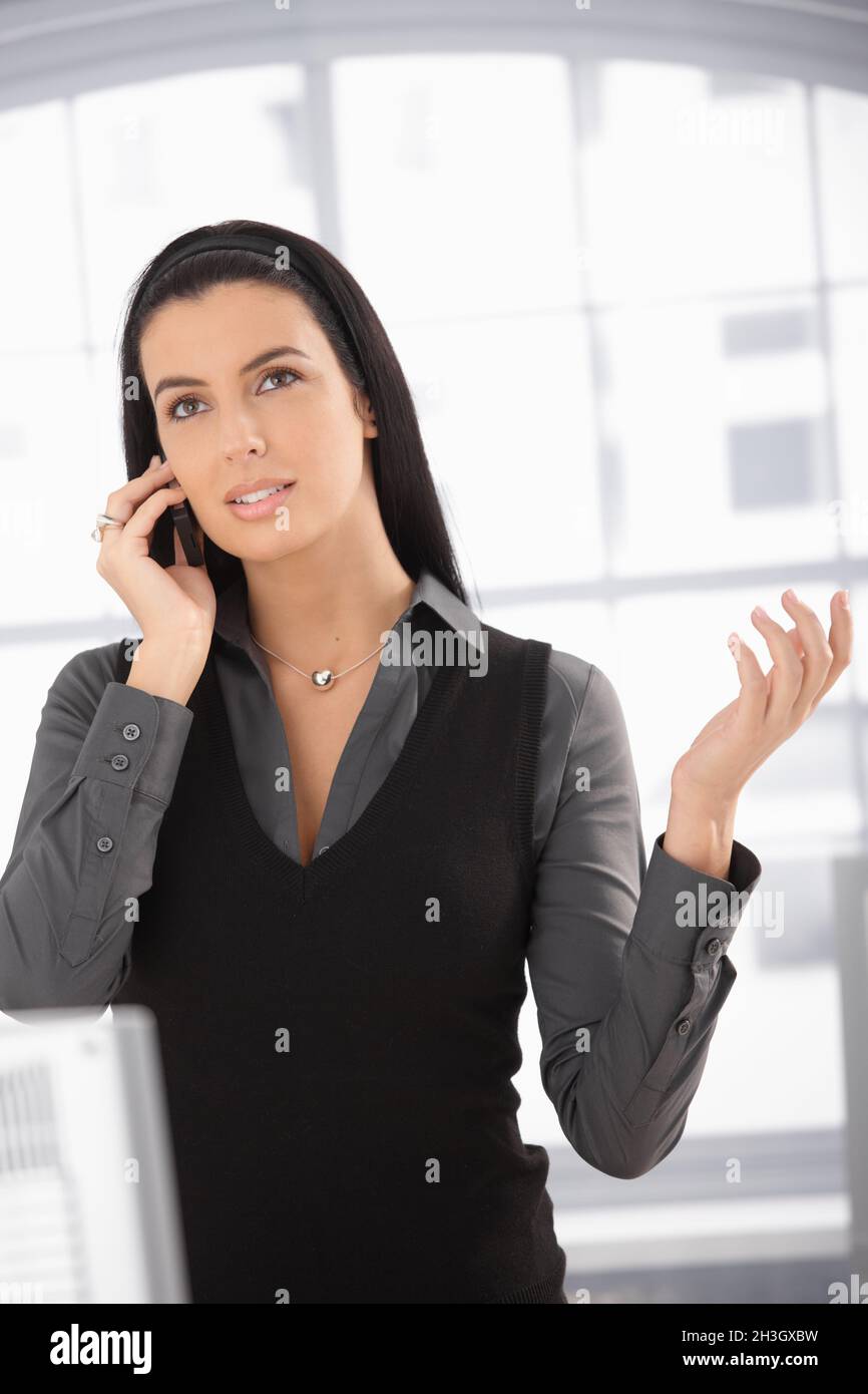 Attractive woman on mobile call Stock Photo