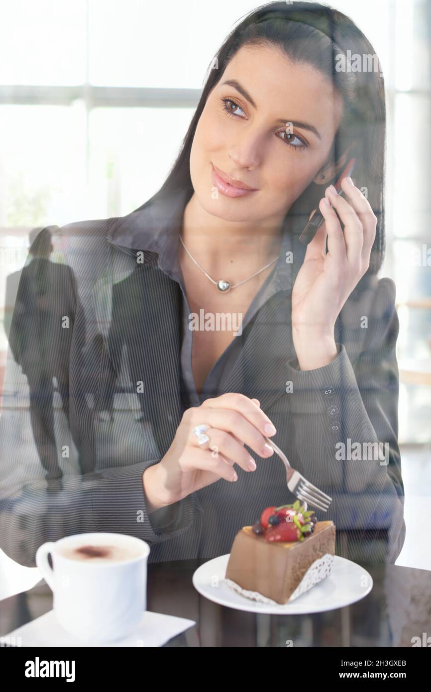 Businesswoman in office cafe Stock Photo