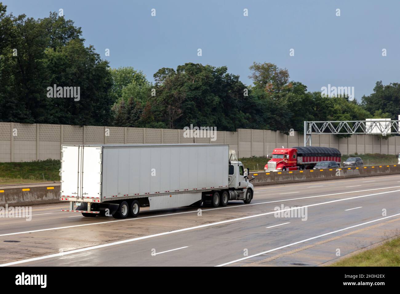 Truck traffic along Interstate Highway I-94, near Kalamazoo, Michigan, USA  by James D Coppinger/Dembinsky Photo Assoc Stock Photo
