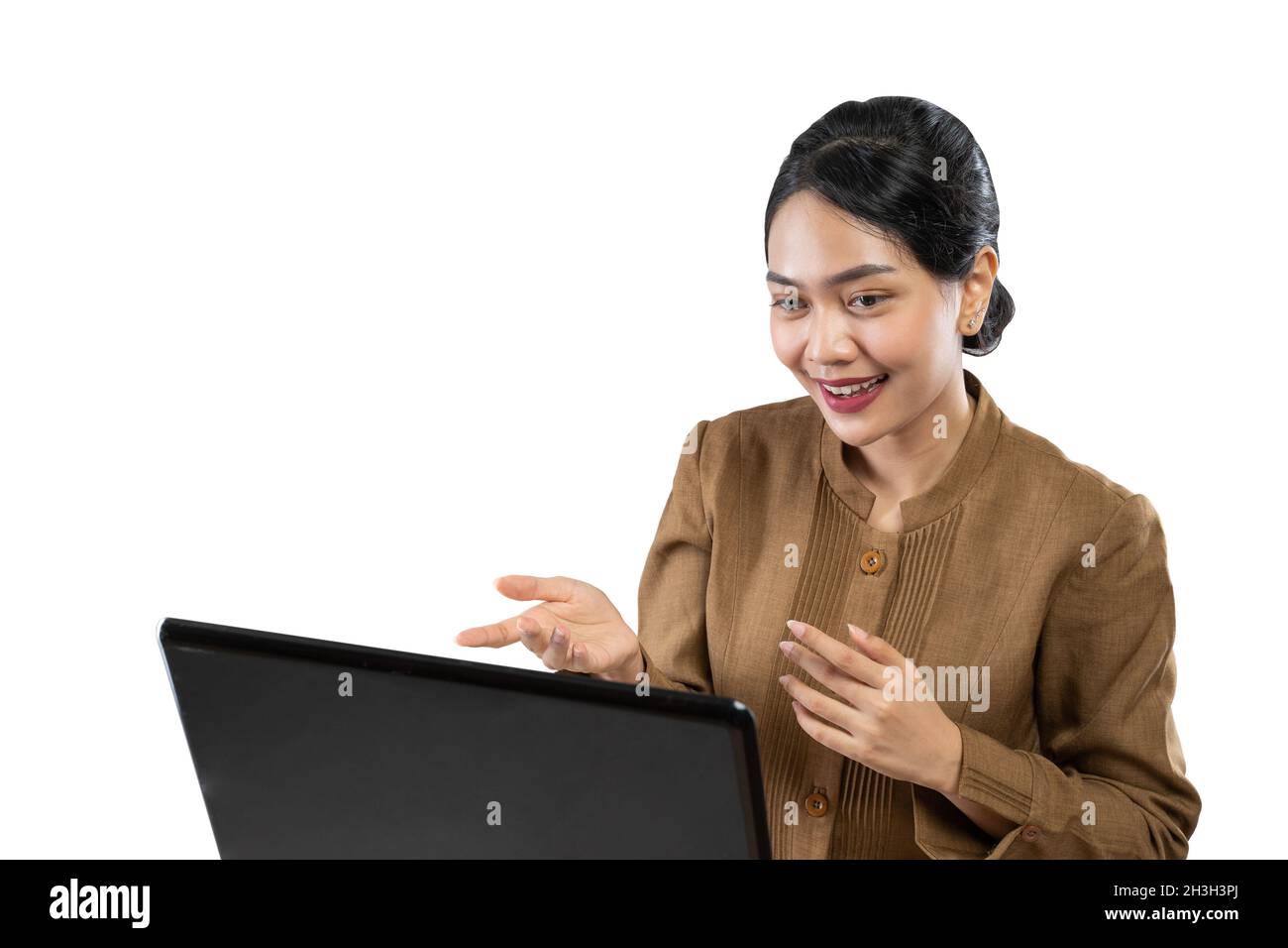 Smiling woman in civil servant uniform using laptop to work Stock Photo