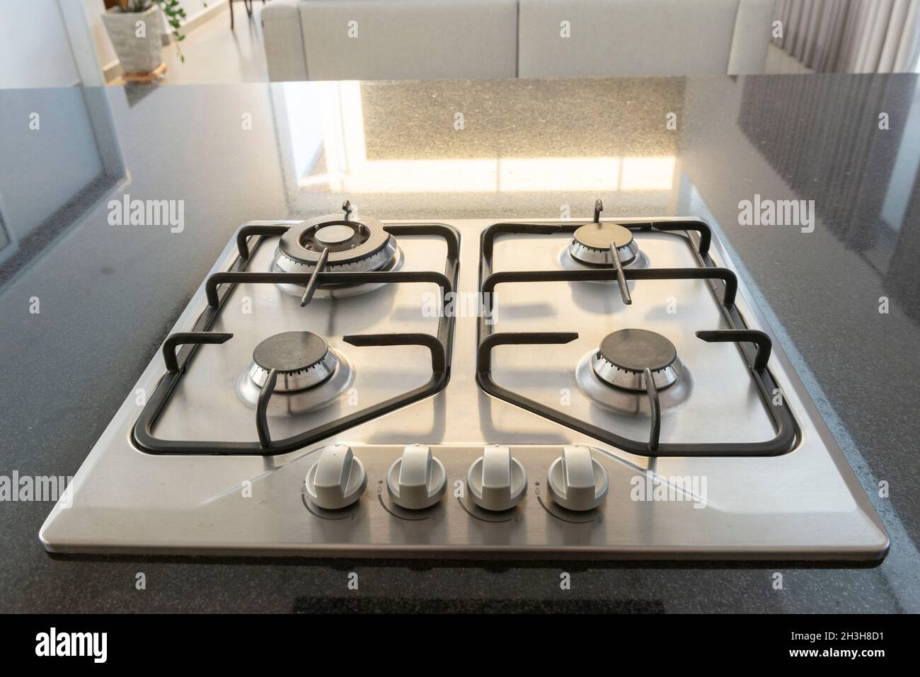 Modern hob gas stove made of stainless steel using natural gas or propane for cooking products