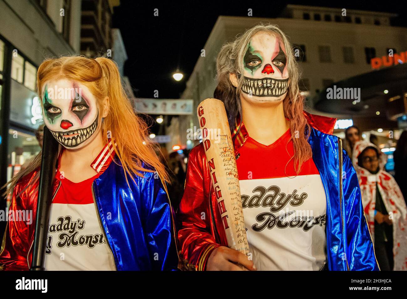 Arnhem, Netherlands. 28th Oct, 2021. Two girls dressed like Harley Quinn in their zombie version are seen during the parade.Last two years the zombie walk was canceled due to the Coronavirus pandemic, Arnhem, Netherlands. 28Th Oct, 2021. Two Girls Dressed Like Harley Quinn In Their Zombie Version Are Seen During The Parade.Last Two Years The Zombie Walk Was Canceled Due To The Coronavirus Pandemic,