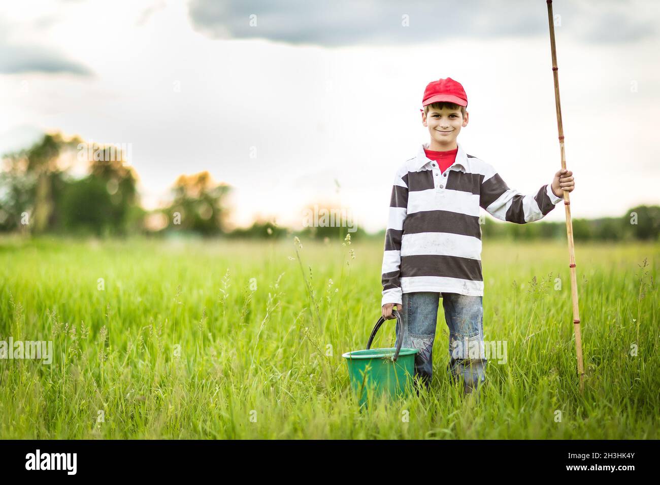 Boy fishing in a river hi-res stock photography and images - Alamy