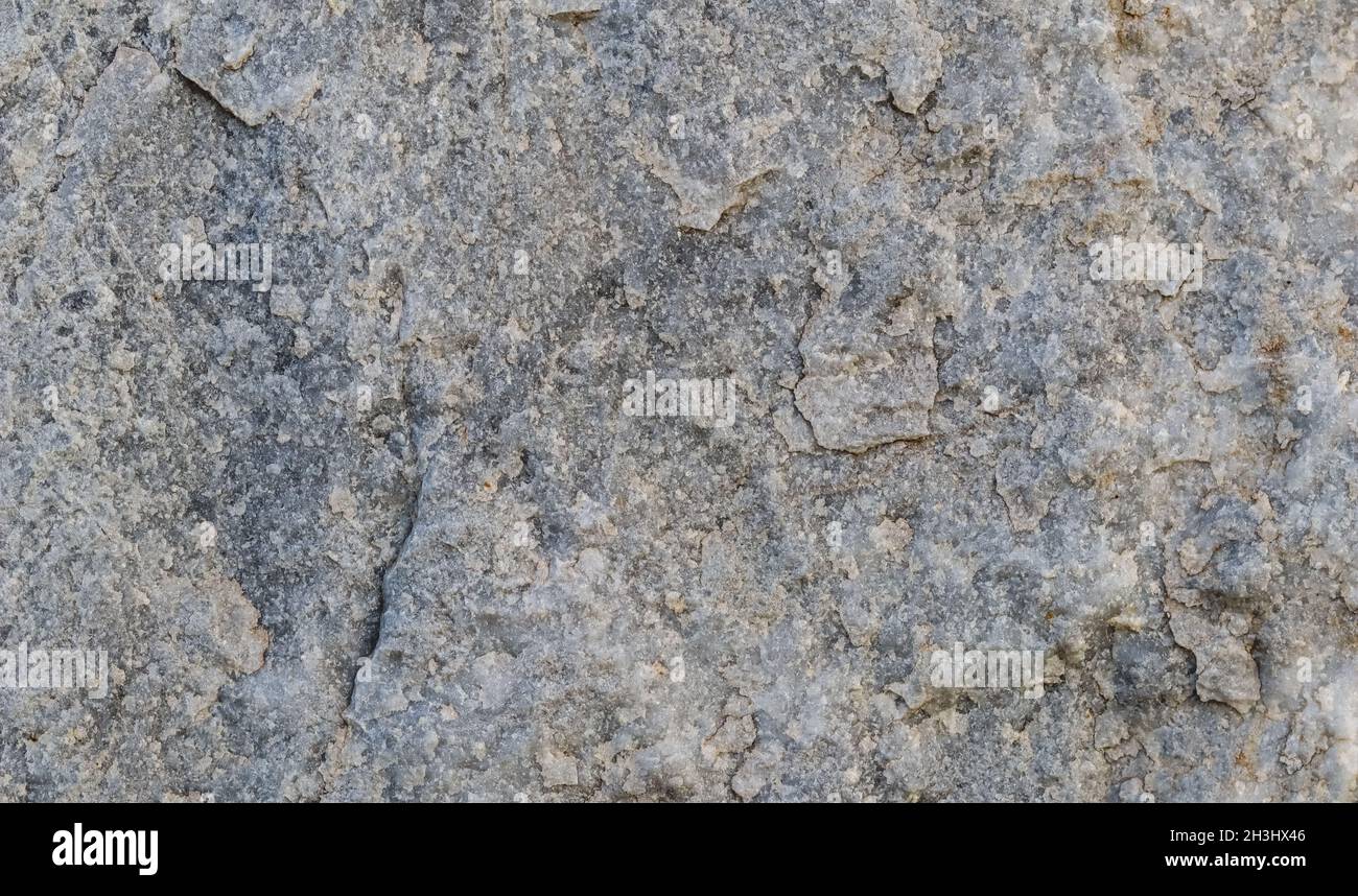 Natural gray stone as a background or texture seamless for design. High ...