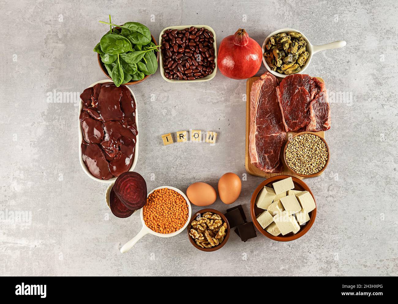 Foods high in Iron, including eggs, nuts, spinach, beans, tofu, liver