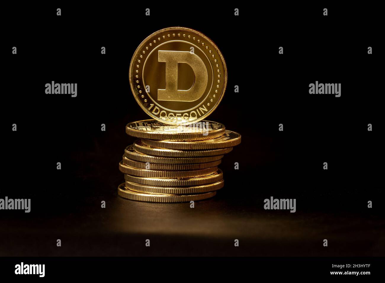 A pile of Dogecoin that has a gold color that is currently popular and has  an increasing value compared to the US Dollar. For payment, finance, invest  Stock Photo - Alamy