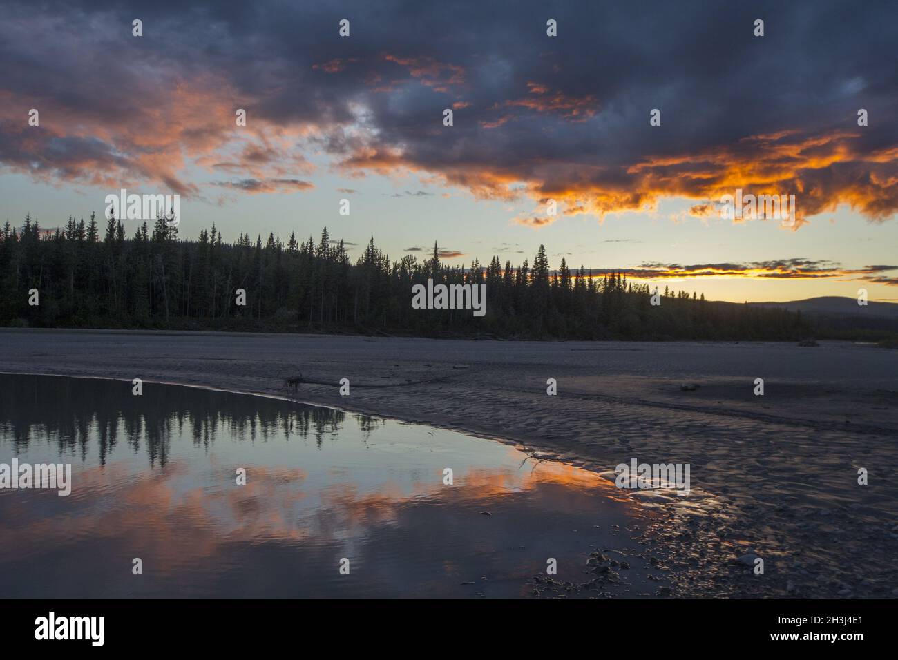 Midnight sun on Yukon Stock Photo