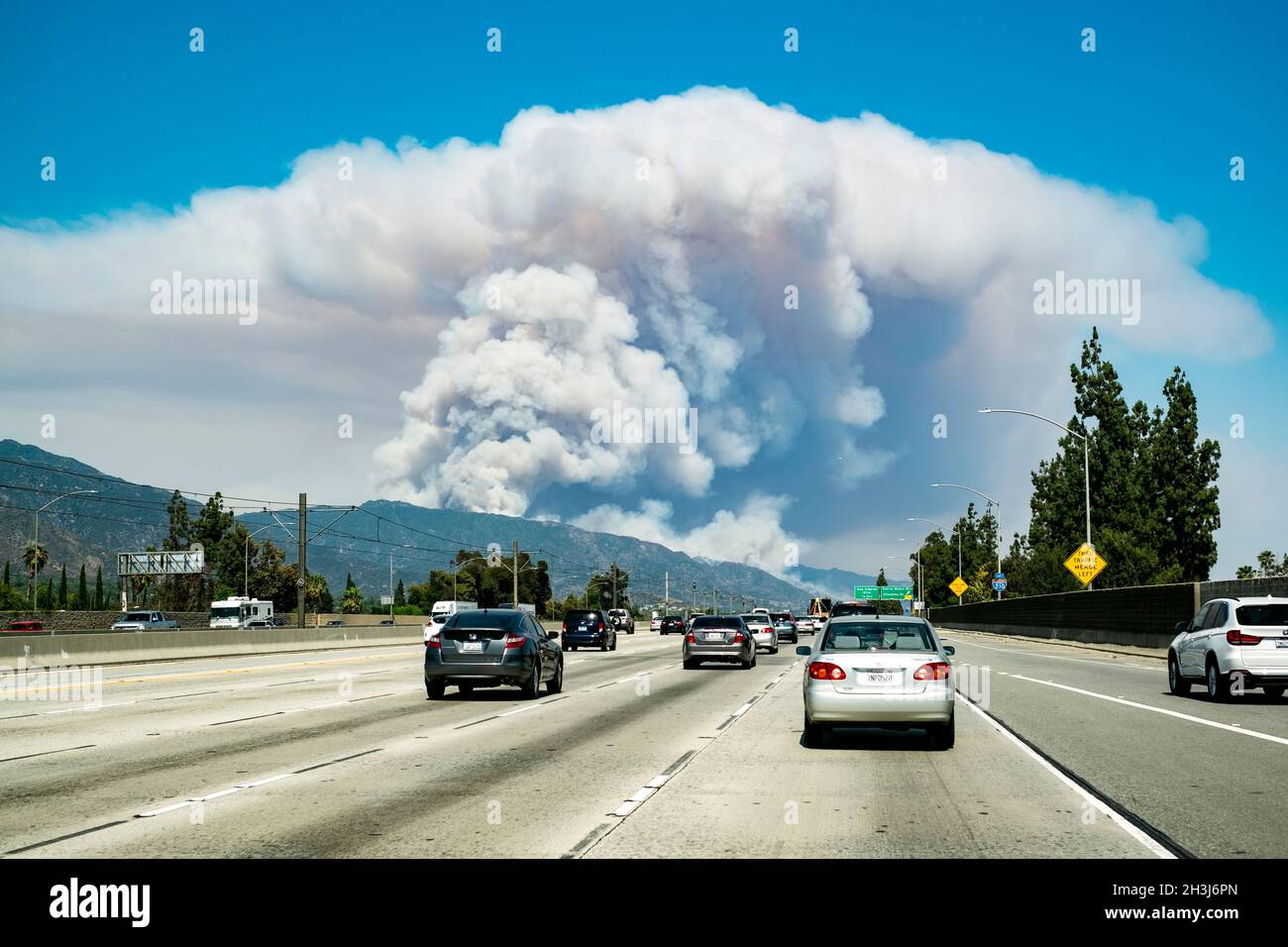 The beginning of a huge wildfire in the San Gabriel mountains, the Complex Fire, on June 20, 2016 taken from the 210 freeway in Pasadena, California Stock Photo