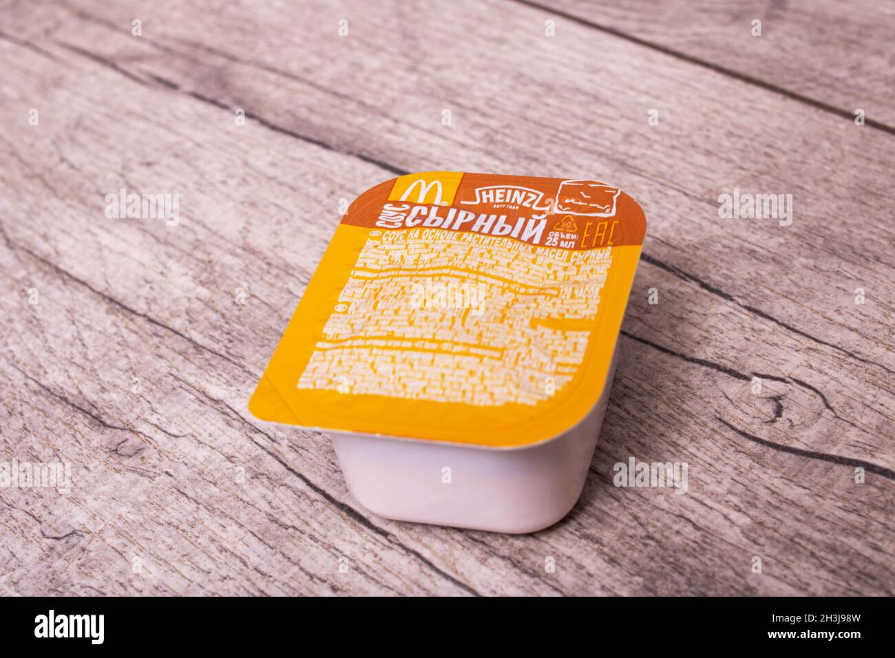 BELARUS, POLOTSK 23 OCTOBER, 2021 McDonald's Cheese Sauce Container