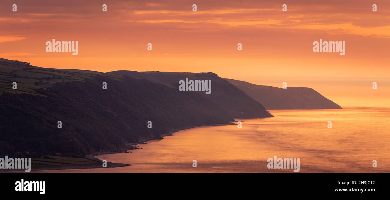 Beautiful October evening sunset from Bossington Hill Exmoor with a view over Porlock Bay, Somerset south west England Stock Photo