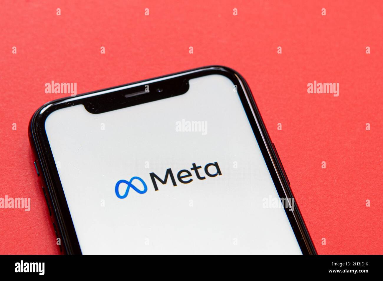 Milan, Italy - 28 October 2021: The Meta logo, the rebranded name from the formerly known company called Facebook, is seen on the display of an Apple Stock Photo