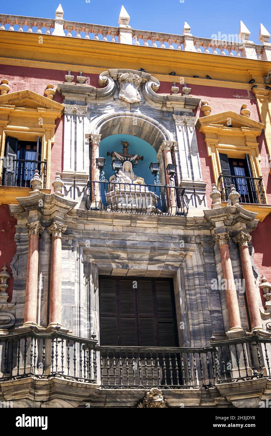 Sculptures on the facade of the Episcopal Palace in Malaga, Spain Stock Photo