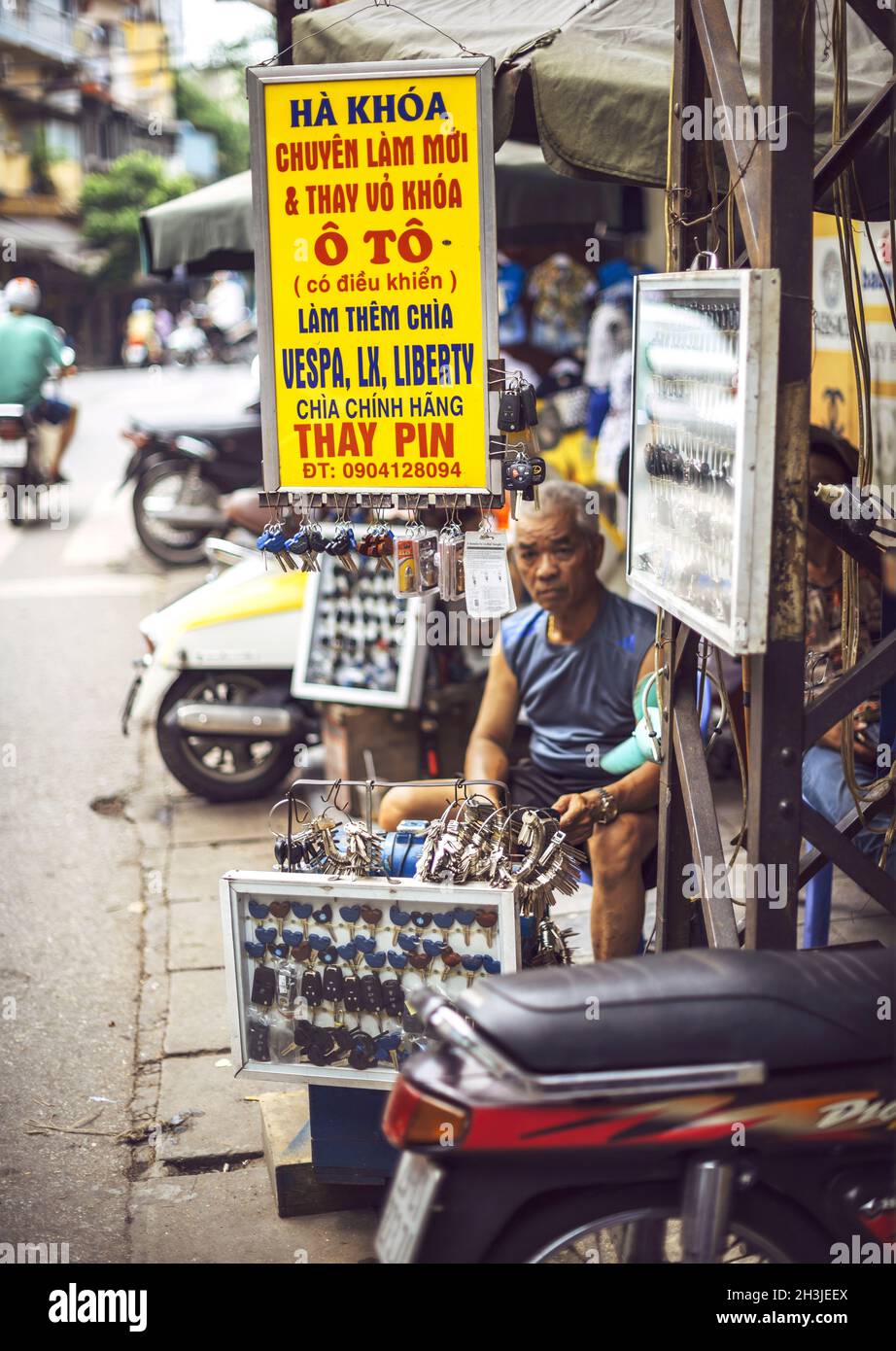 HO CHI MINH CITY, VIETNAM - APR 18, 2015: The stalls of key makers and selling lockpads on the street of Cho Lon, on April 18, 2 Stock Photo