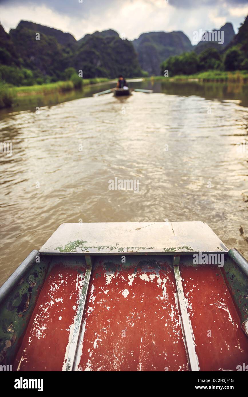 Boat sailing the river in Tamcoc, Ninhbinh, Vietnam Stock Photo