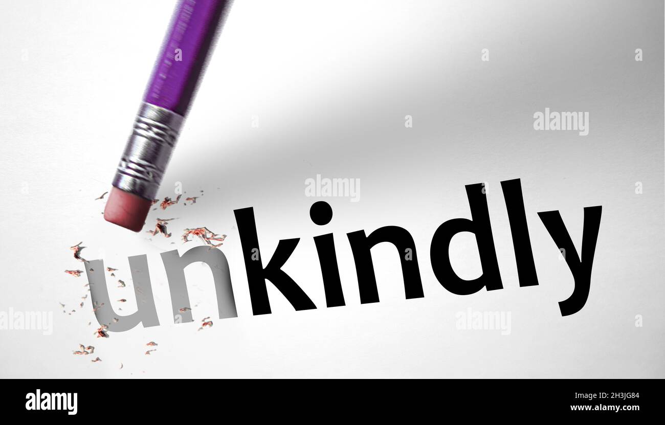 Eraser changing the word Unkindly for Kindly Stock Photo Alamy