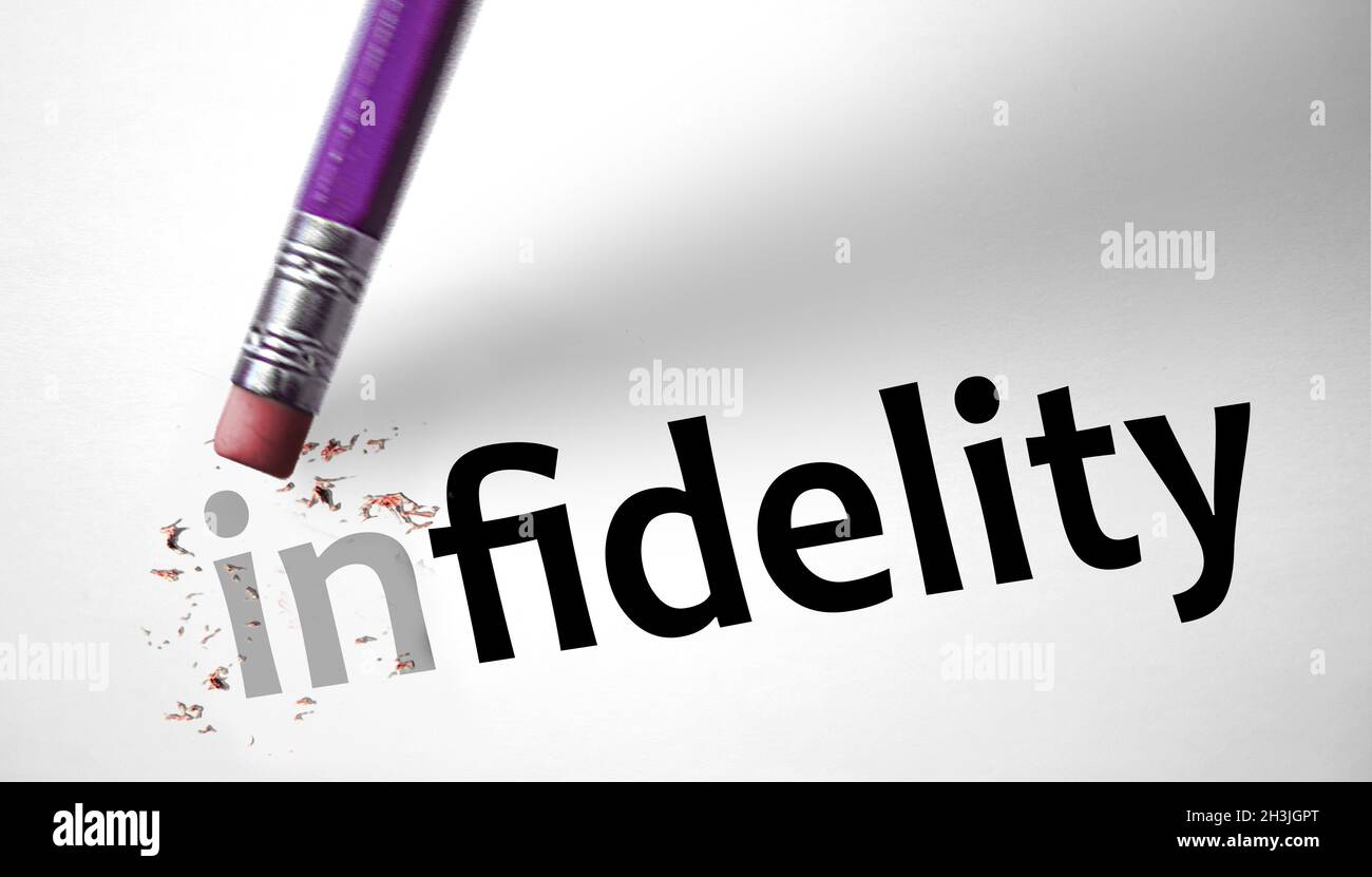 Eraser changing the word Infidelity for Fidelity Stock Photo