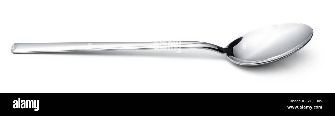 Silver shiny spoon isolated on white background Stock Photo - Alamy
