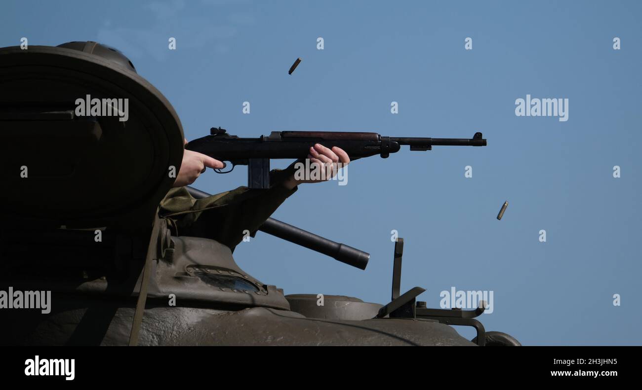East Kirkby. Lincolnshire. Lanc and Tanks. August 2021. Enactor firing weapons from tank turret. Stock Photo