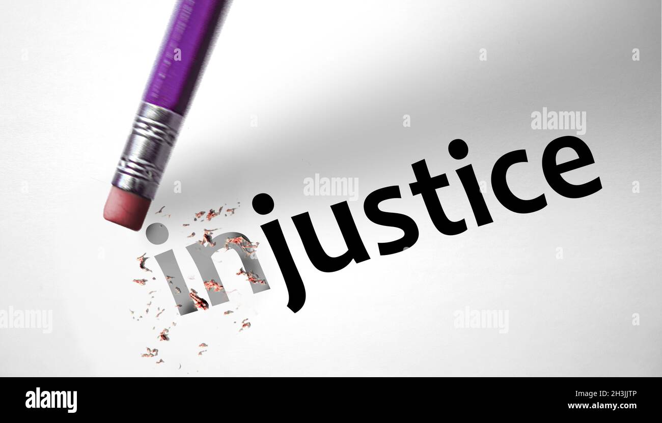 Eraser changing the word Injustice for Justice Stock Photo