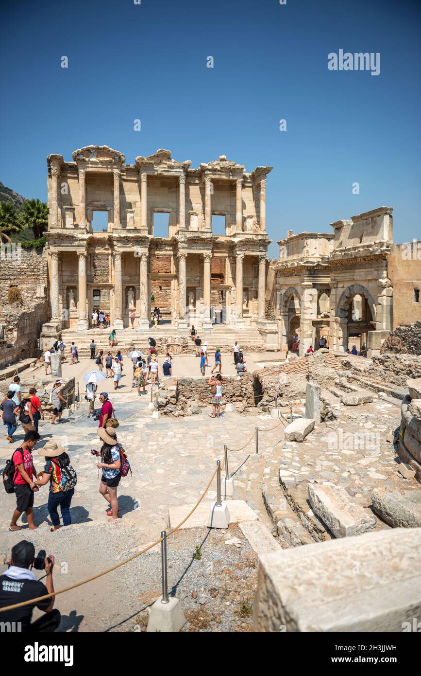 EPHESUS, TURKEY - AUG 01: visitors in Curetes street on August 01, 2014 in Ephesus, Turkey. Ancient Ephesus contains the largest Stock Photo