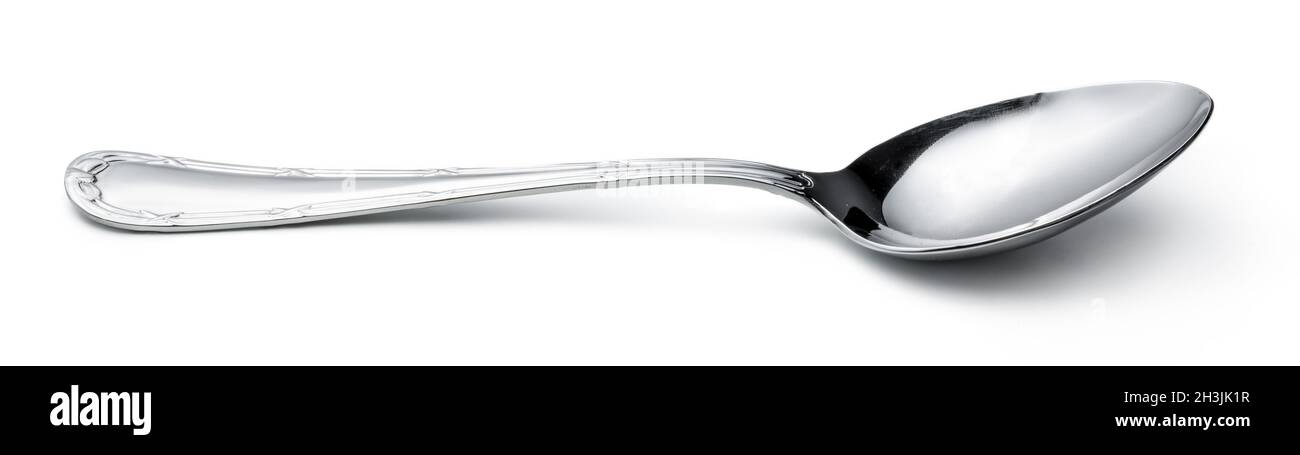Silver shiny spoon isolated on white background Stock Photo - Alamy
