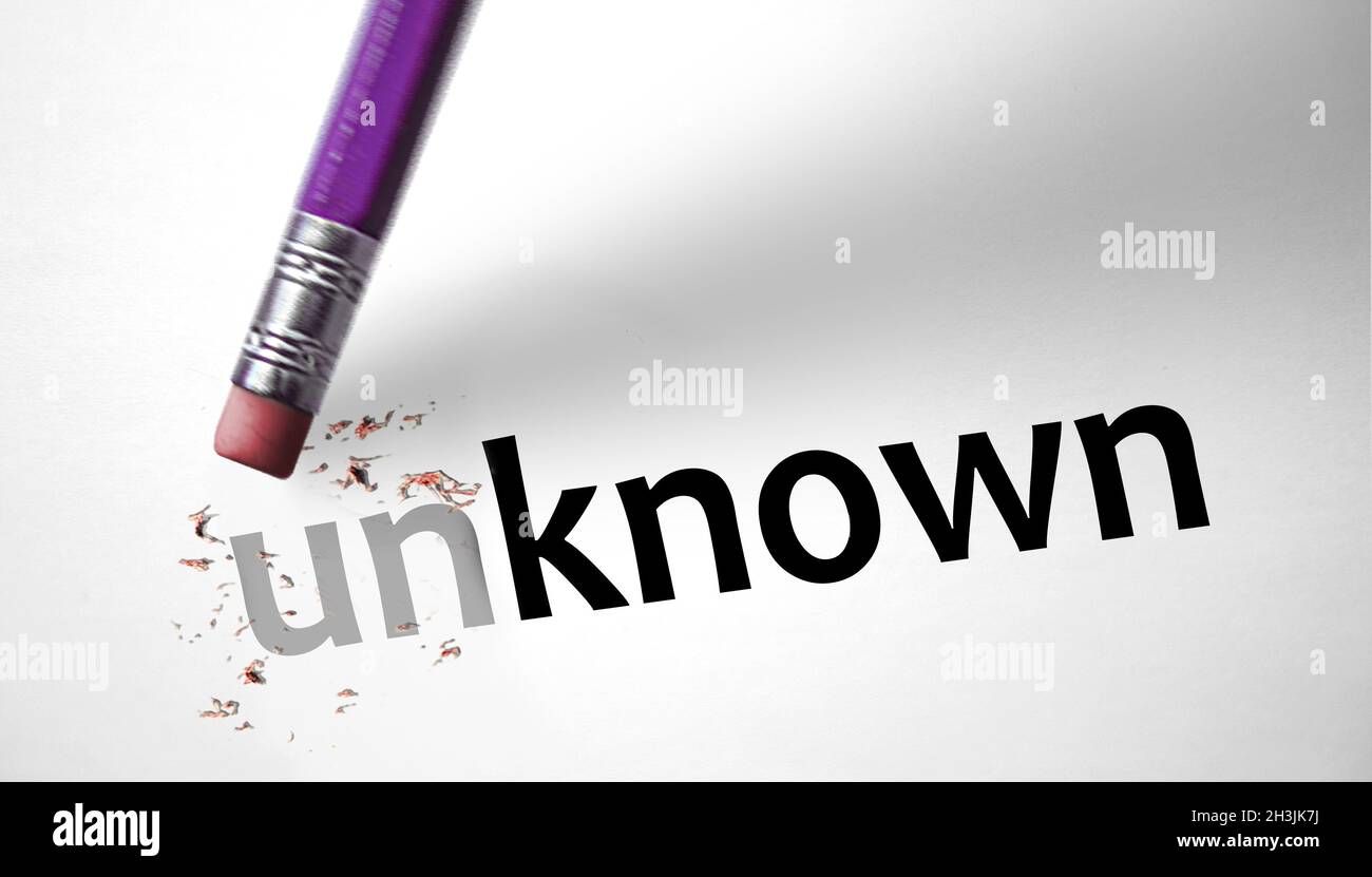Eraser changing the word Unknown for Known Stock Photo