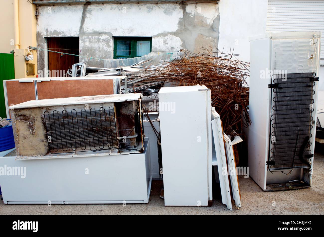 Dump the old broken appliances. Throwing out obsolete appliances Stock