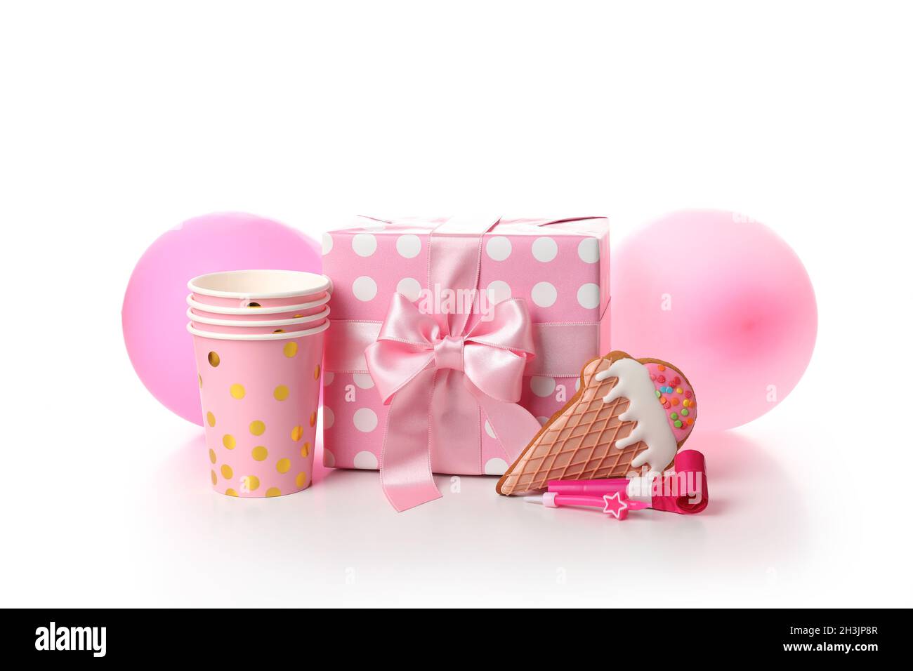 Pink birthday accessories isolated on white background Stock Photo