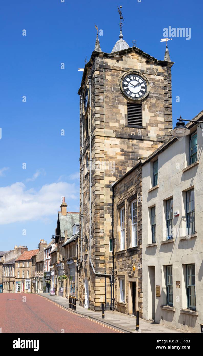 The Town Hall Clock Tower from Fenkle Street in Alnwick Northumberland Northumbria England UK GB Europe Stock Photo