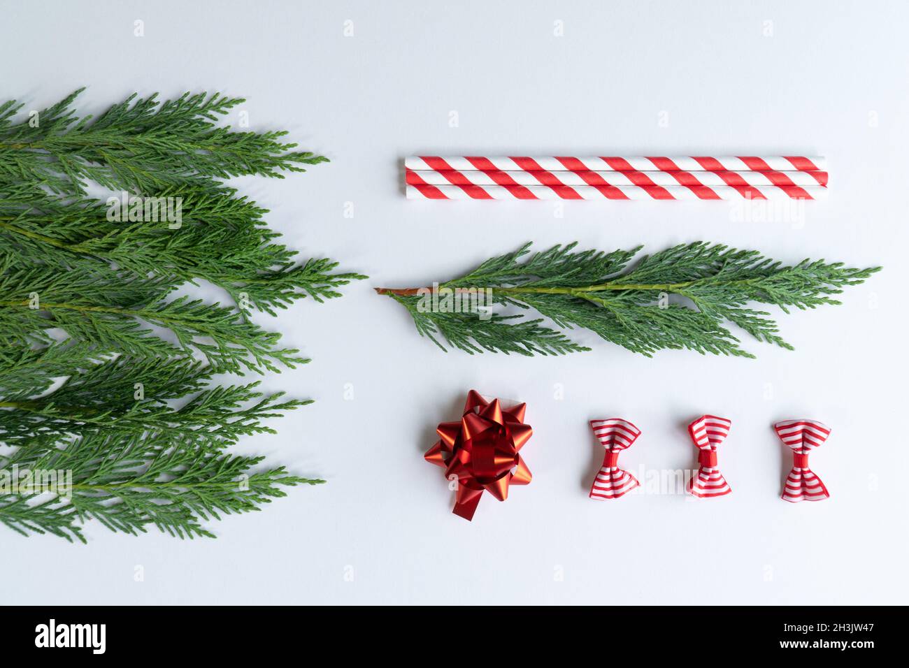 Christmas concept top view noel tree or star or pipette or ribbon photo on white background Stock Photo