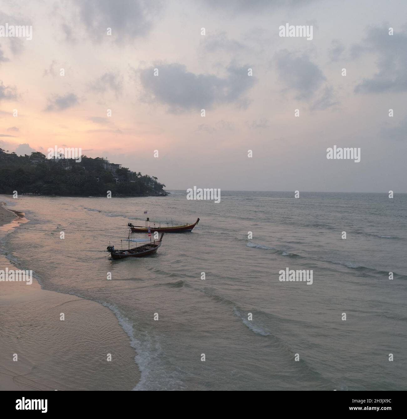 Aerial view of fishing boats in sea at beautiful sunset Stock Photo - Alamy