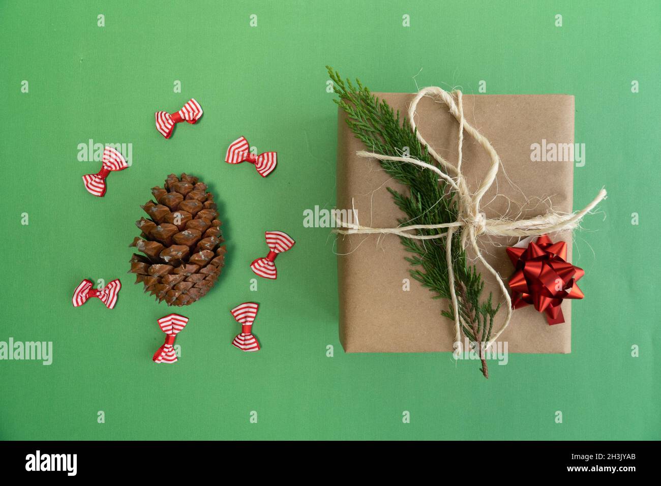 Gift box with pine cone, christmas gift box with pine cone, concept top view photo idea Stock Photo