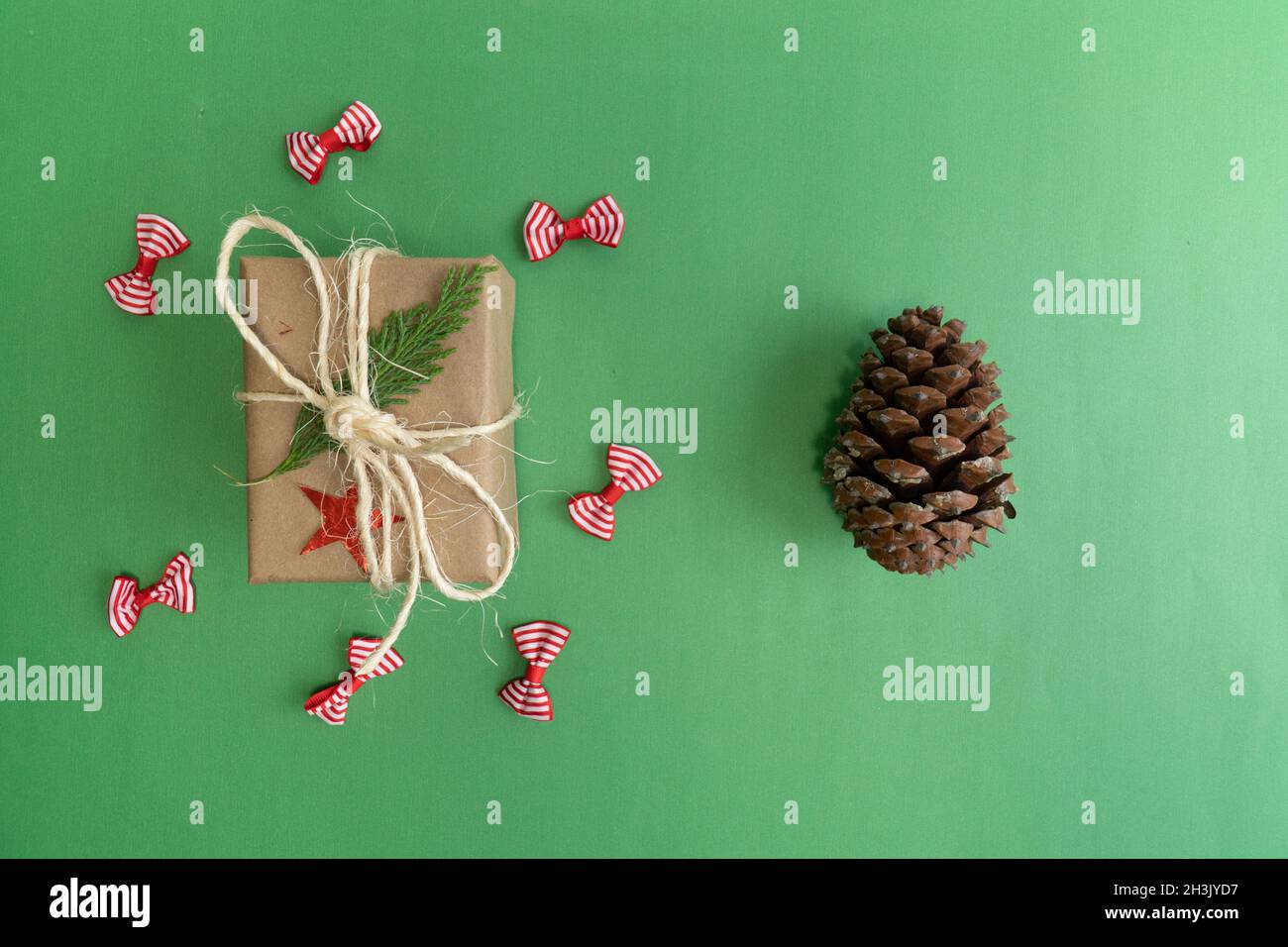 Gift box with pine cone, noel gift box with pine cone, christmas top view photo idea Stock Photo