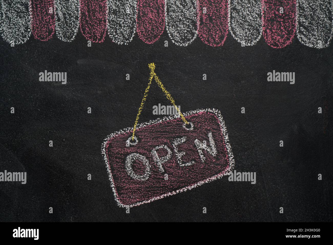 Shop cafe roof with open sign on chalkboard Stock Photo