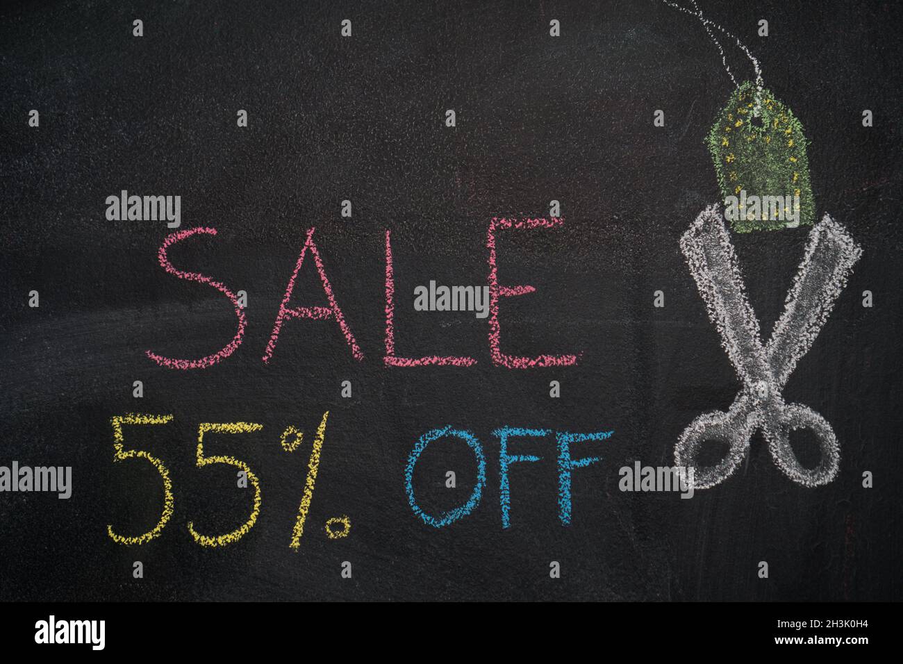 Sale 55% off on chalkboard Stock Photo