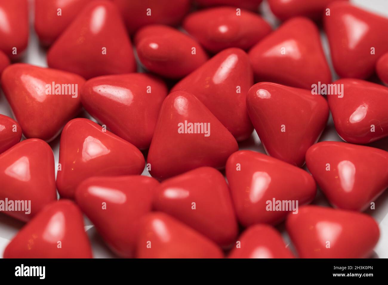 Red triangle pills Stock Photo Alamy