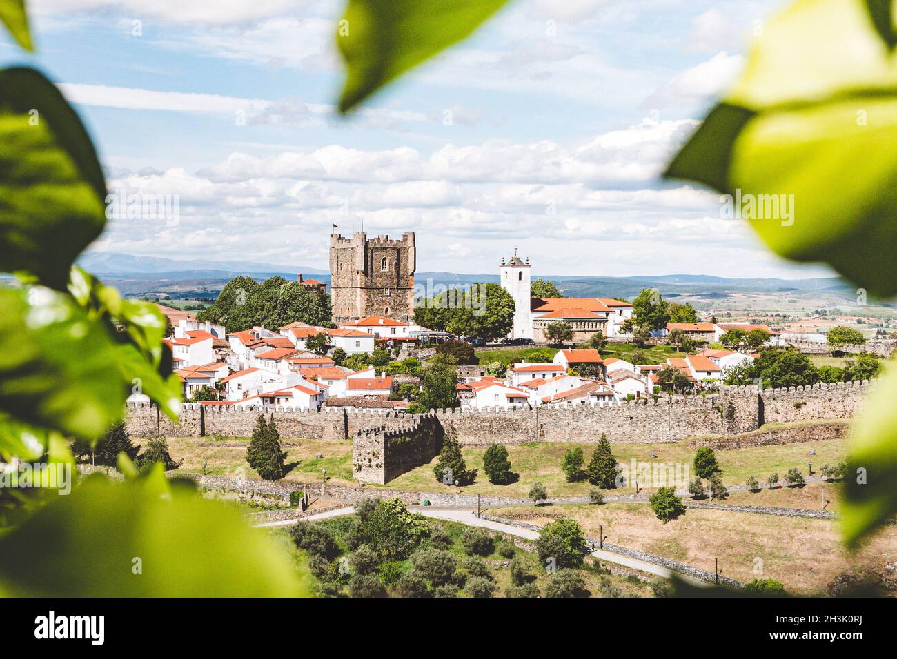 Braganca castle, portugal through the leafs Stock Photo