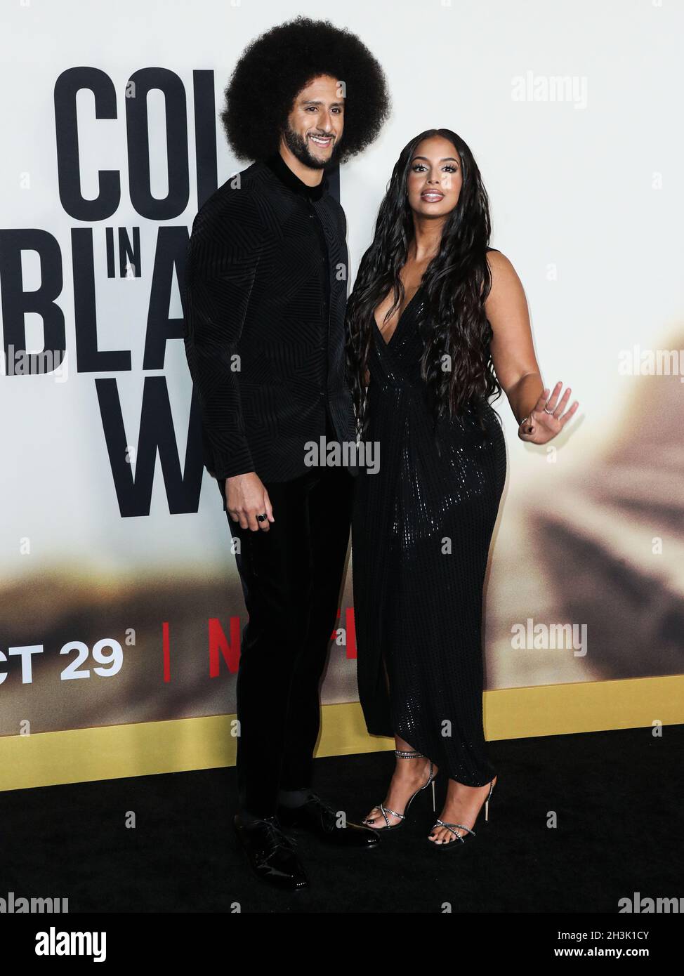 LOS ANGELES, CALIFORNIA, USA - OCTOBER 28: American civil rights activist  and former football quarterback Colin Kaepernick and girlfriend/American  radio personality Nessa Diab arrive at the Los Angeles Premiere Of  Netflix's 'Colin