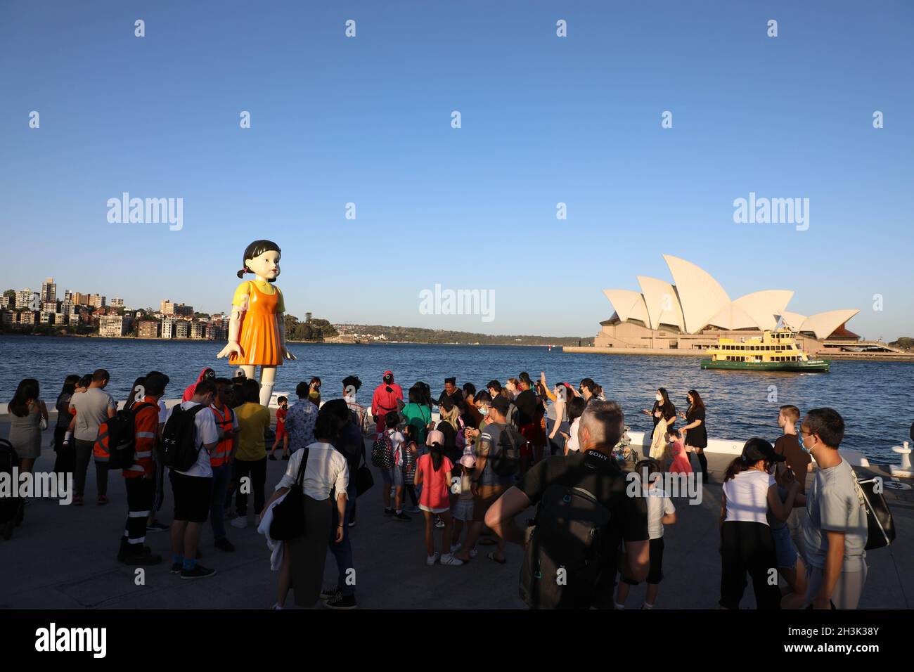 Sydney, Australia. 29th Oct, 2021. The replica animated doll from the  Netflix series Squid Game has been installed at Sydney Harbour for  Halloween. The doll, which is 4.5 metres tall and weighs