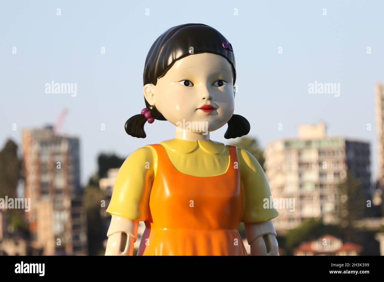 Sydney, Australia. 29th Oct, 2021. The replica animated doll from the  Netflix series Squid Game has been installed at Sydney Harbour for  Halloween. The doll, which is  metres tall and weighs
