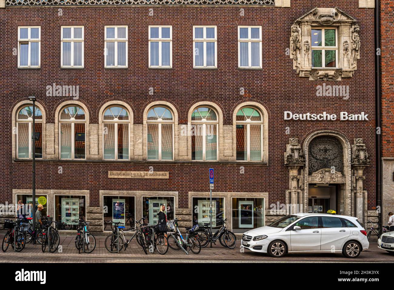 Old brick building in Lübeck now home to Deutsche Bank Wealth Management. Luebeck, Germany, Europe Stock Photo