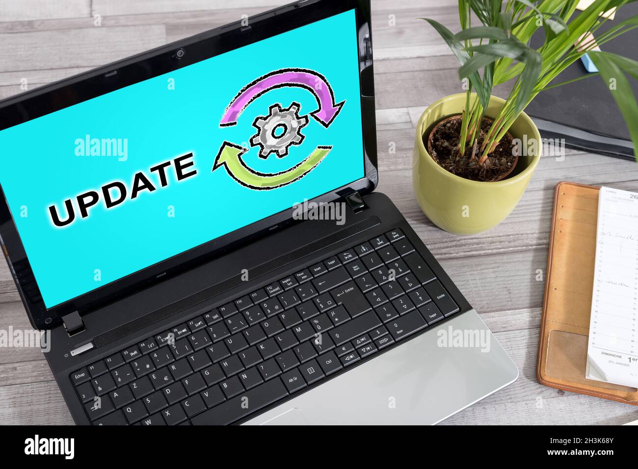 Laptop screen with update concept Stock Photo - Alamy