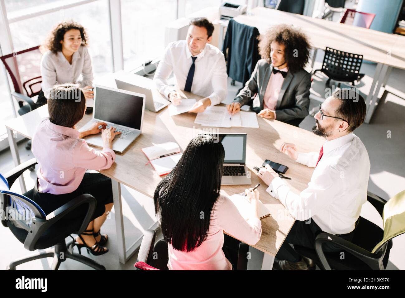 Business consultants working in a team. Stock Photo