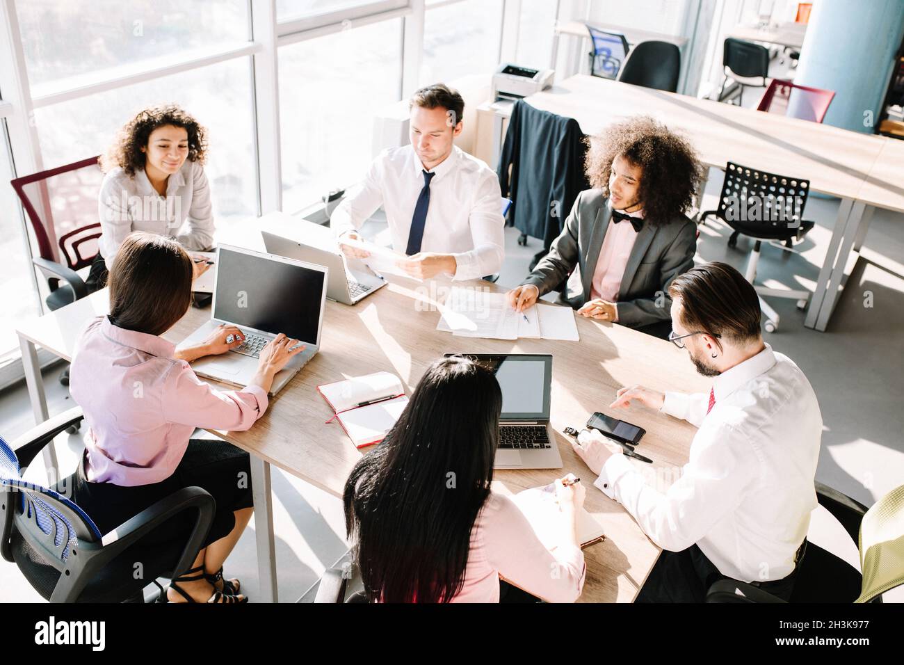 Business consultants working in a team. Stock Photo